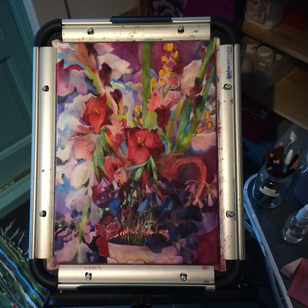 A mixed-media painting in progress inside Juju's garden studio